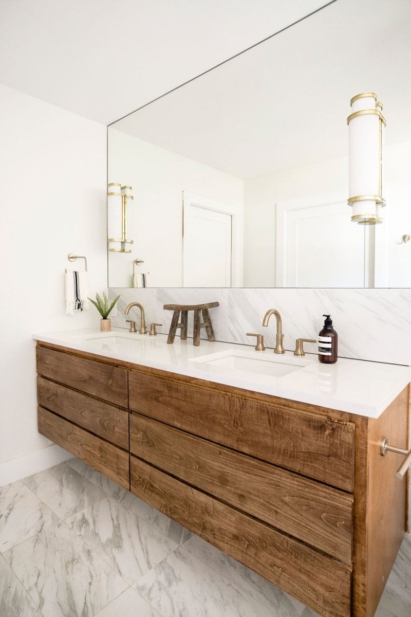 Marble bathroom with wood vanity